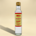 Bottle of Barista-it Cheesecake Syrup on a yellow background.