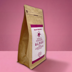 Barista-It Kraft paper coffee bag with a pink label on a pink background (Everyday-It blend)